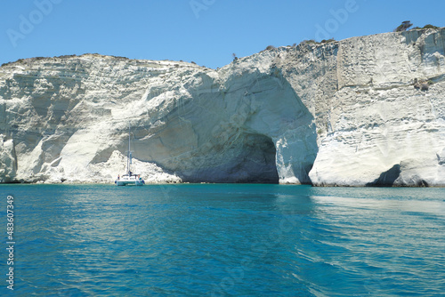 Beautiful Kleftiko, a scenic white volcanic rock formation bay visited by sail boats and yachts with emerald crystal clear sea and caves, Milos island, Greece