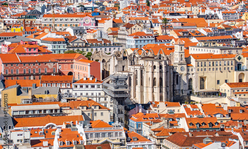 View over the red roofs of Lisbon, Alfama district with pastel colored houses. Portugal 
