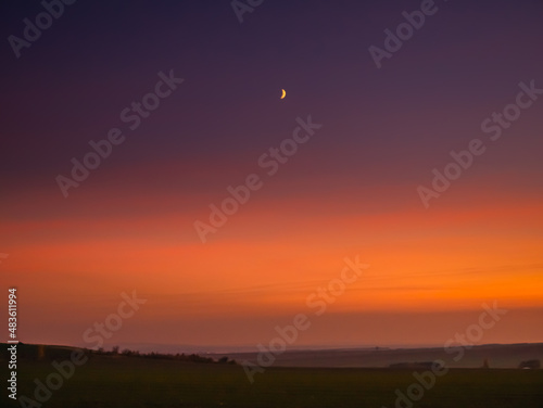 Moon on a evening sky,colour gradient, natural background.  . © Jansk