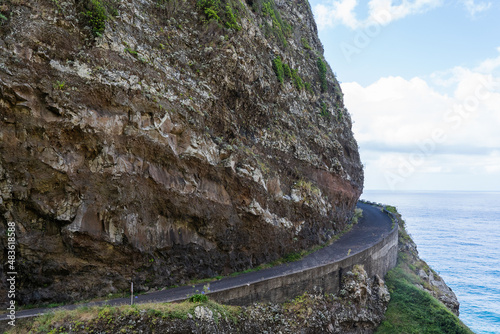Dangerous part of the old road with rockfall photo
