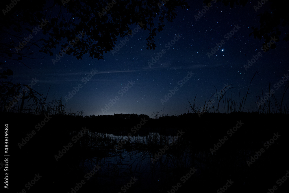 Fototapeta premium starry sky and lake