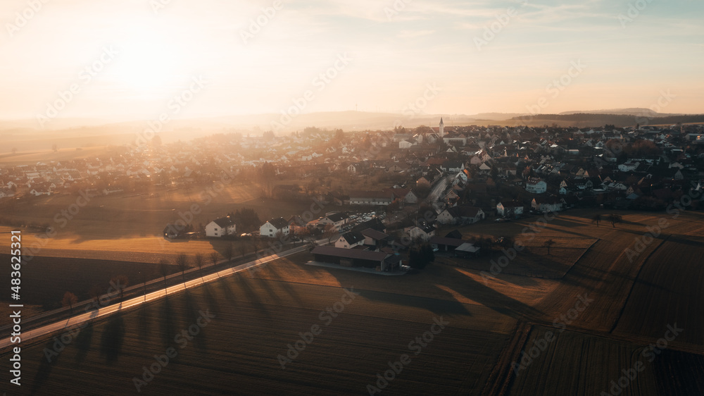 Aerial sunset view small town of Böhmenkirch, near Göppingen, Baden Württemberg, Germany