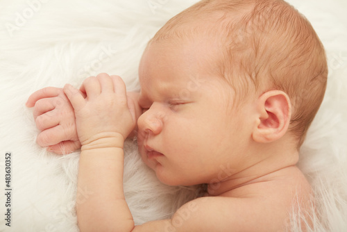 newborn girl sleeping