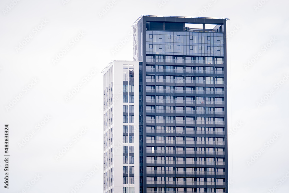 a skyscraper building with a glass facade, office building, copy space, space for text, selective focus
