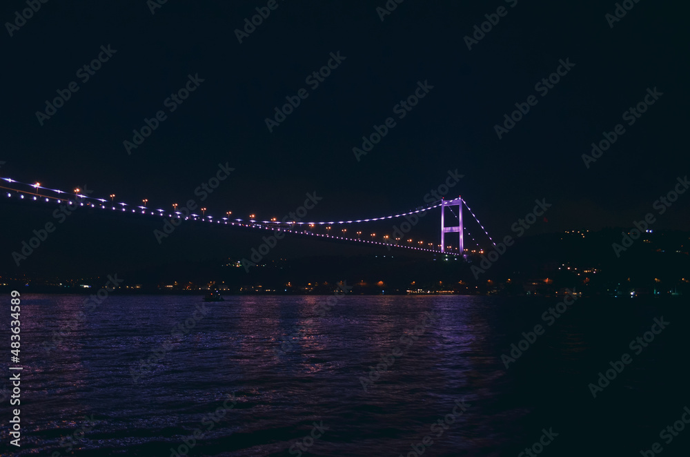 Obraz premium bosphorus istanbul night lights bridge castle