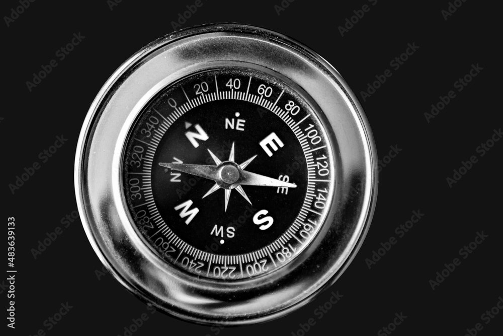 silver compass isolated on black background silver compass isolated on black background