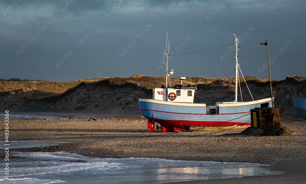 traditional fisher boats on the beach in northern Denmark in norre vorupor
