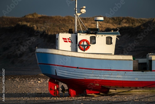 traditional fisher boats on the beach in northern Denmark in norre vorupor photo
