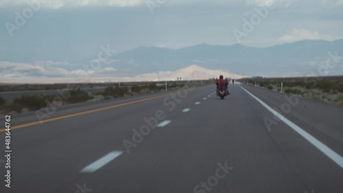 Biker driving on the Highway on legendary Route 66 to Oatman, Arizona.
