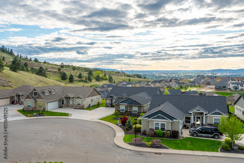 Fototapeta View from a hilltop in Liberty Lake, Washington, of  a newer subdivision of homes with the cities  of Spokane and Spokane Valley