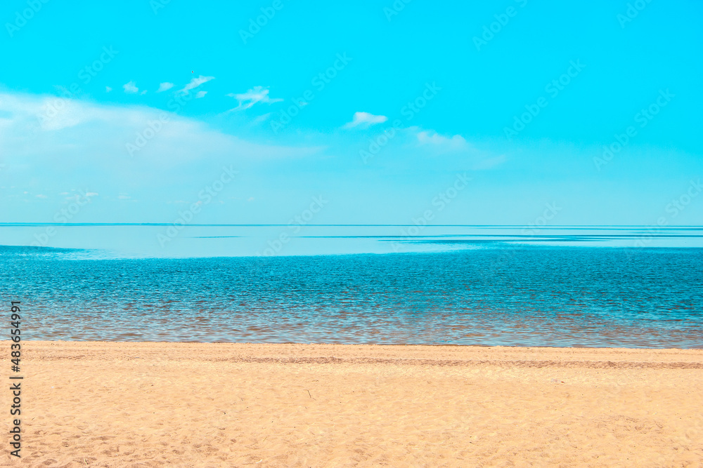 Calm on the Baltic Sea coast. The Gulf of Finland on a clear sunny summer day. Background. Copy space.