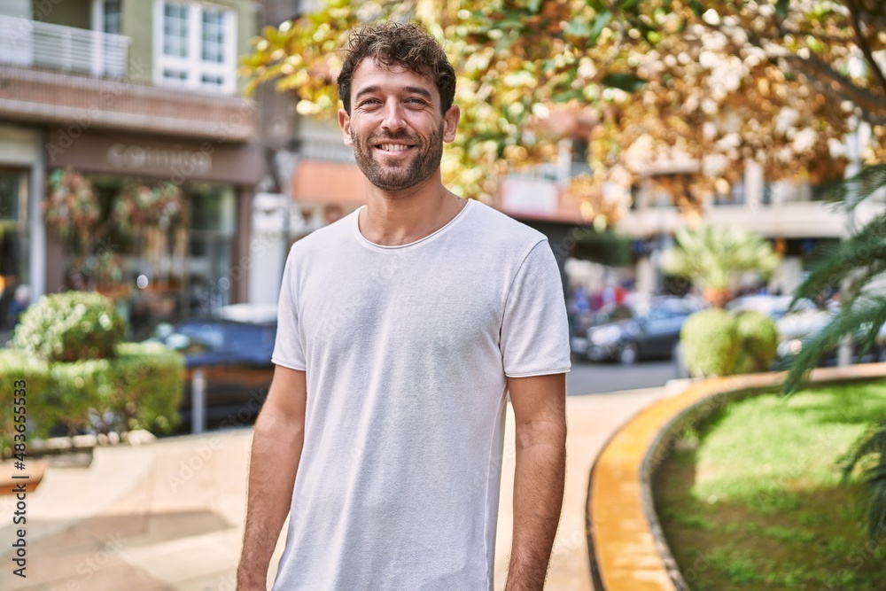 Young hispanic man smiling confident walking at park Young hispanic man smiling confident walking at park