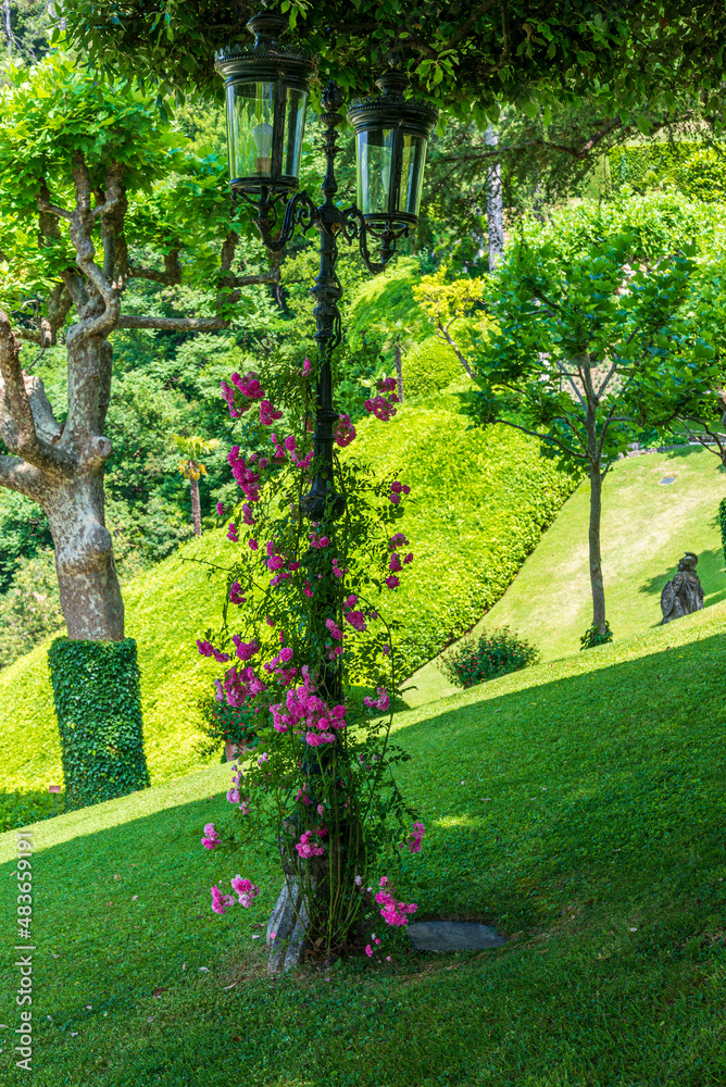 The gardens of the Villa del Balbianello in the municipality of Lenno overlooks Lake Como located at the tip of the small wooded peninsula of Dosso d'Avedo on the western shore of Lake Como, Italy. Ju