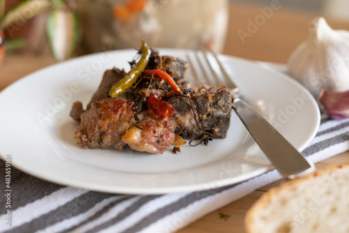 A traditional Guyanese Christmas dish called garlic pork (ID: 483659161)