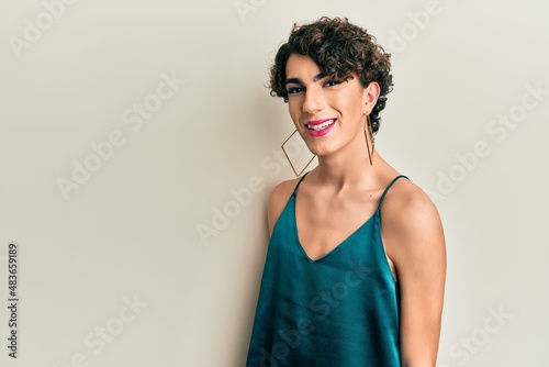 Obraz na płótnie Young transgender man wearing make up and woman clothes, looking fashion and gla