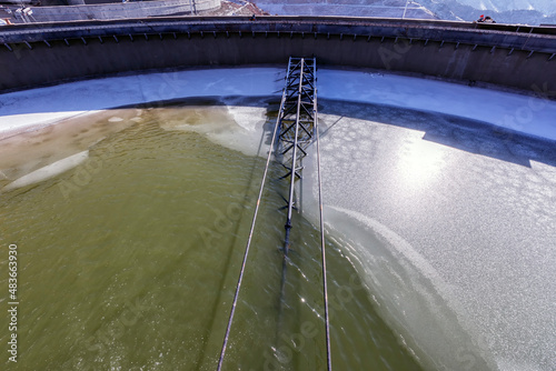 Slika na platnu Interior view of the large concrete thickener in the mining process factory