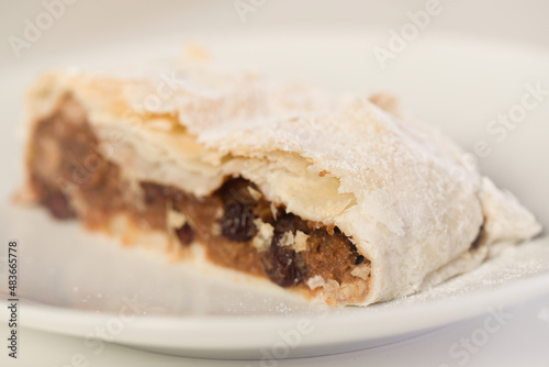 Making of classic strudel fille with apples, cranberries, walnuts and cinnamon
