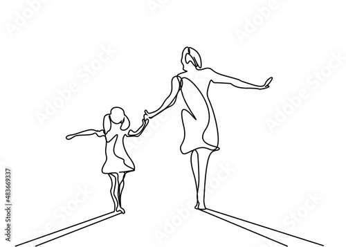 mother and daughter having fun and walking outside together
