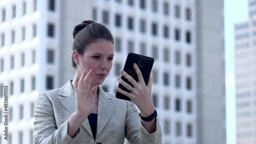 Excited Businesswoman gets good news on her tablet