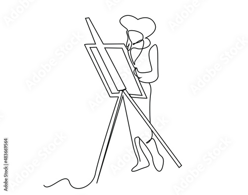 A female artist paints. A female teacher and student in an art class.