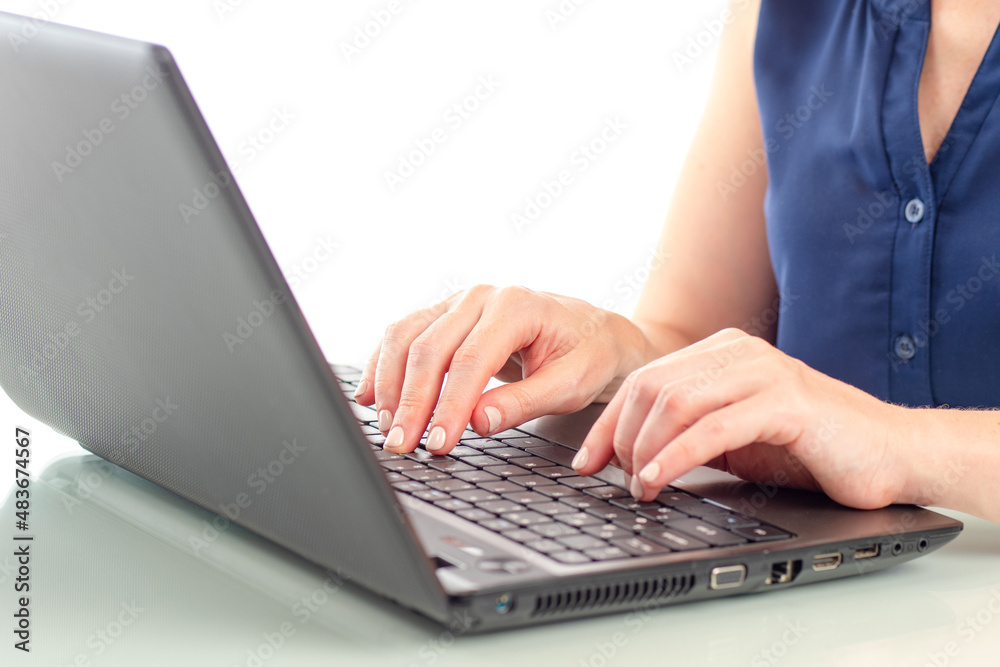 Businesswoman laptop. Hands are typing on keyboard. Women's hands on keys. Businesswoman use computer. Laptop close up. Concept of using computer for business. Using laptop for business tasks Businesswoman laptop. Hands are typing on keyboard. Women's hands on keys. Businesswoman use computer. Laptop close up. Concept of using computer for business. Using laptop for business tasks