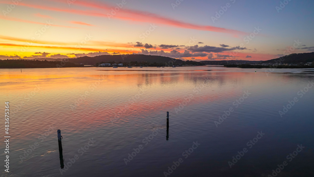 Fototapeta premium Sunrise over the bay with clouds