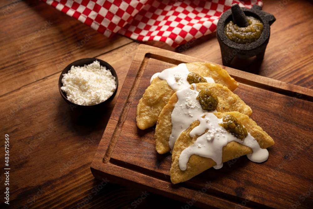 Quesadillas fritas. Traditional Mexican appetizer "garnacha"..Deep
