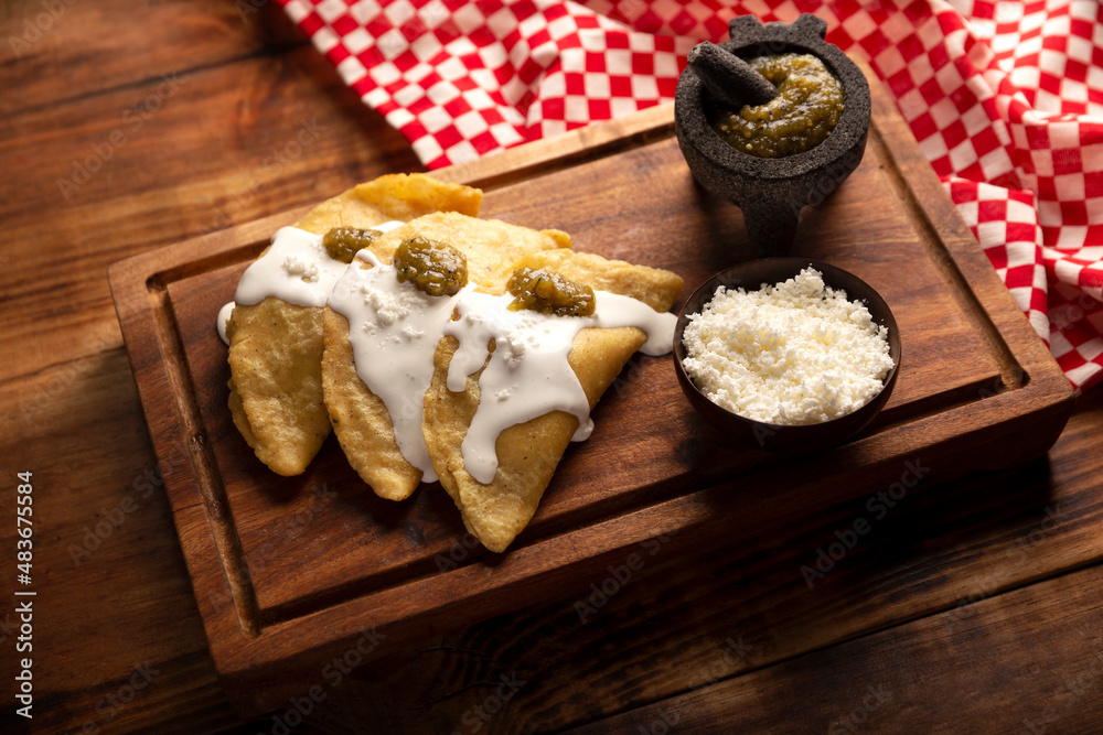 Quesadillas fritas. Traditional Mexican appetizer "garnacha"..Deep