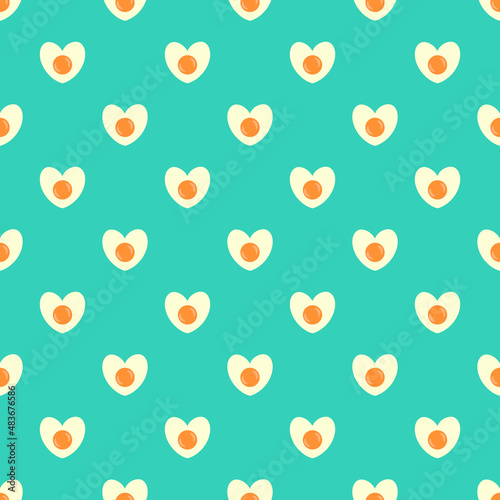 Seamless pattern with heart shaped egg. Abstract Valentine s Day pattern with fried eggs. Blue background with cute omelette.