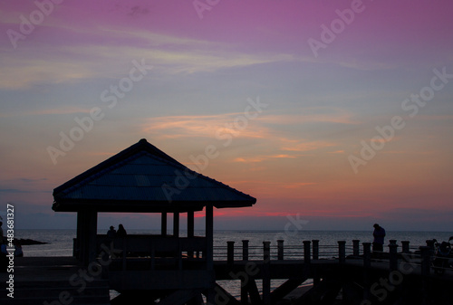 Silhouette evening sunset at port area in thailand,beautiful sea view background