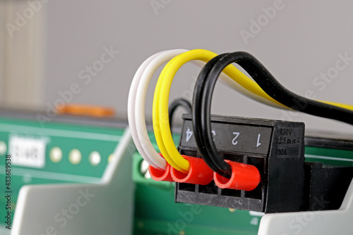 Connecting data transmission wires to a 4-pin terminal in the equipment.