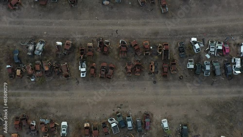 Bottom up aerial cenital shot  from a abandonated car junk photo