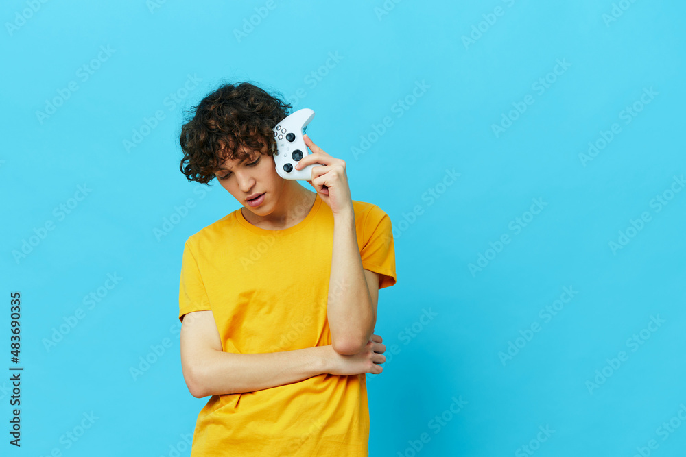 curly guy in headphones plays games gamepad isolated backgrounds curly guy in headphones plays games gamepad isolated backgrounds