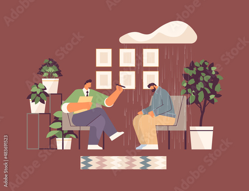 depressed man visiting psychologist male psychotherapist consulting patient during psychotherapy session mental health