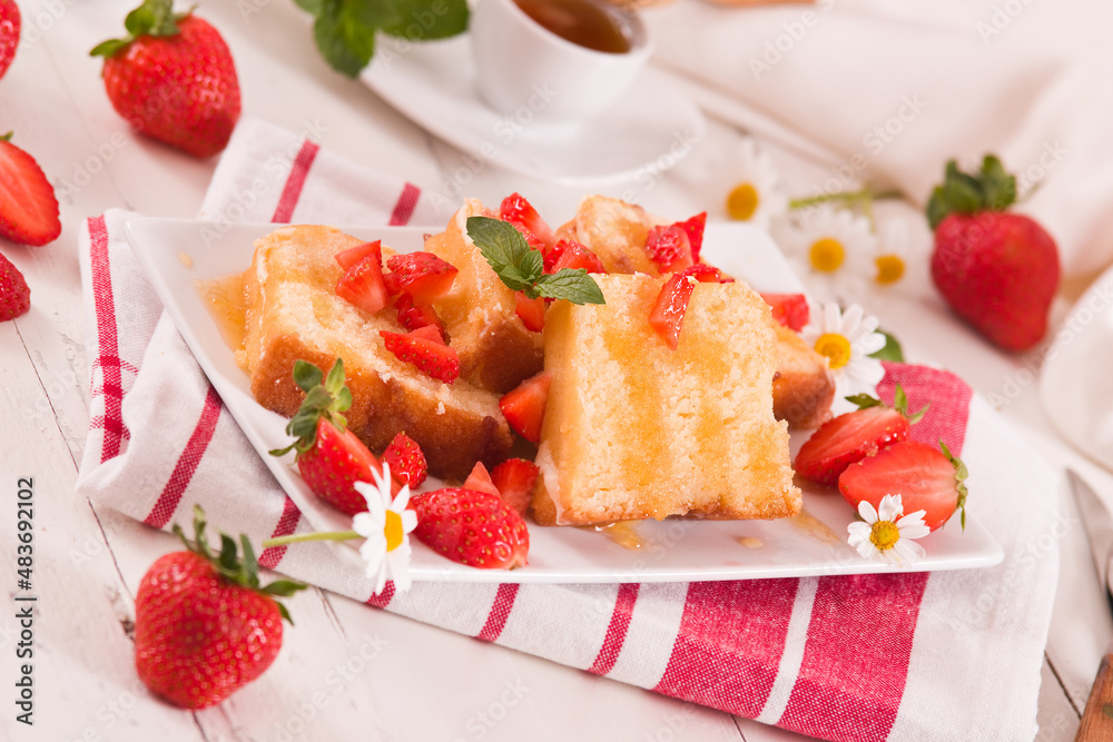 Lemon pound cake with honey and fresh strawberries. Lemon pound cake with honey and fresh strawberries.