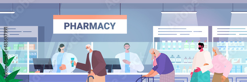 doctor pharmacist giving pills to customers patients at pharmacy counter modern drugstore interior medicine