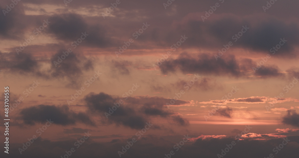 summer sunset skyscape with moving clouds