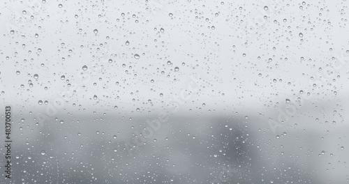 background with raindrops on window glass