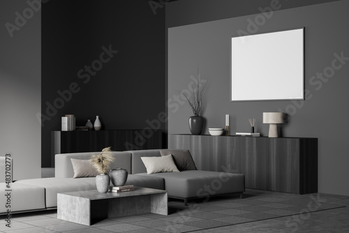 Grey relaxing room interior with sofa and coffee table, drawer and mockup poster