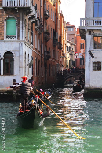 A gondola on a small canal in Venice, Italy, Europe. © jackdreamhd