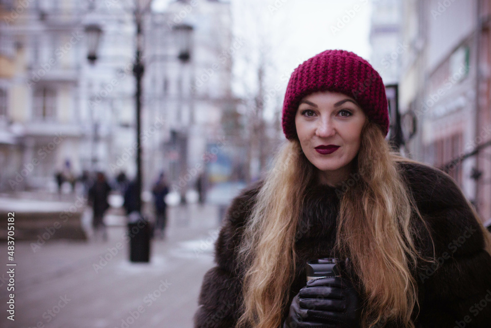 portrait of a girl in winter in a fur coat portrait of a girl in winter in a fur coat