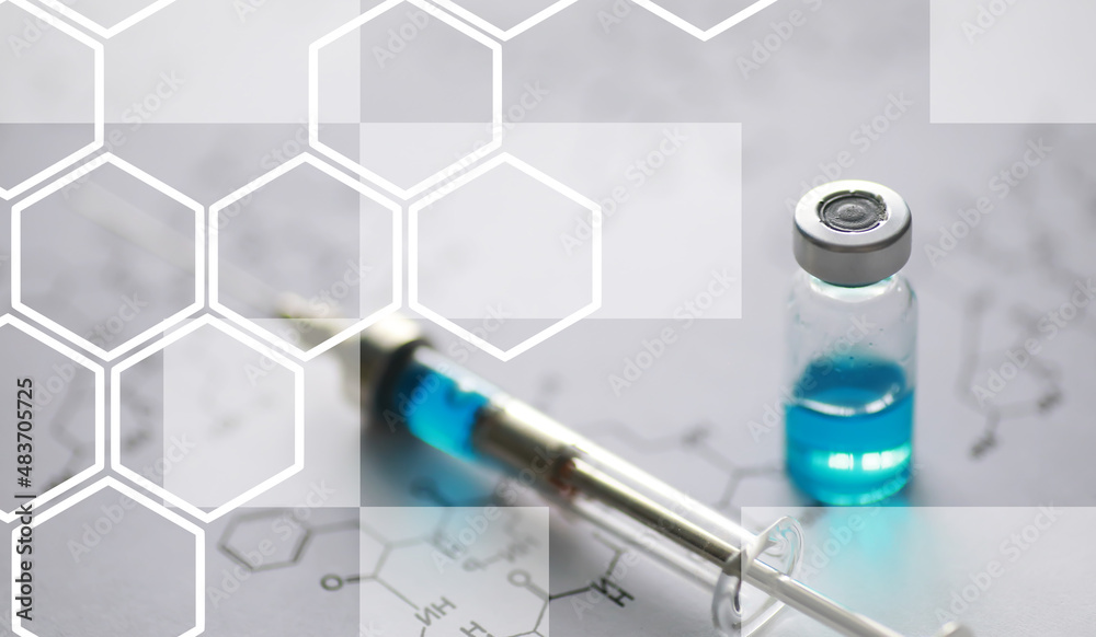 small jars with injection and syringe for injection on a blue background near the chemical formula small jars with injection and syringe for injection on a blue background near the chemical formula