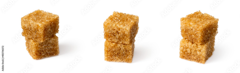 Brown sugar cubes isolated on white background