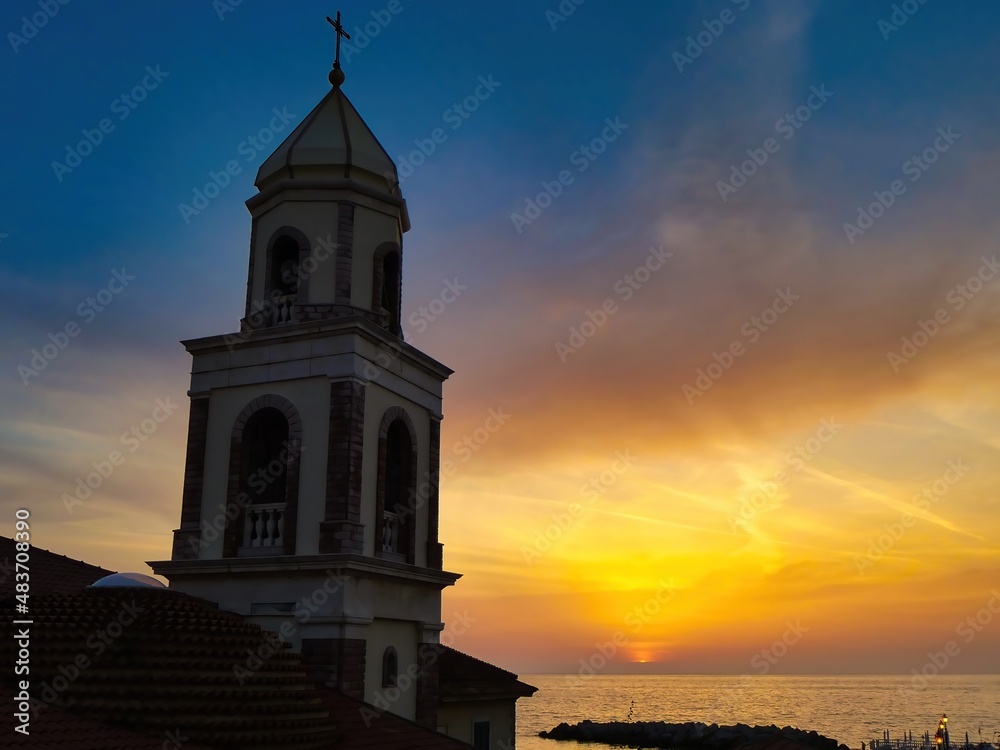 Belltower of a church in Santa Maria di Castellabate at Sunset, Salerno, Italy