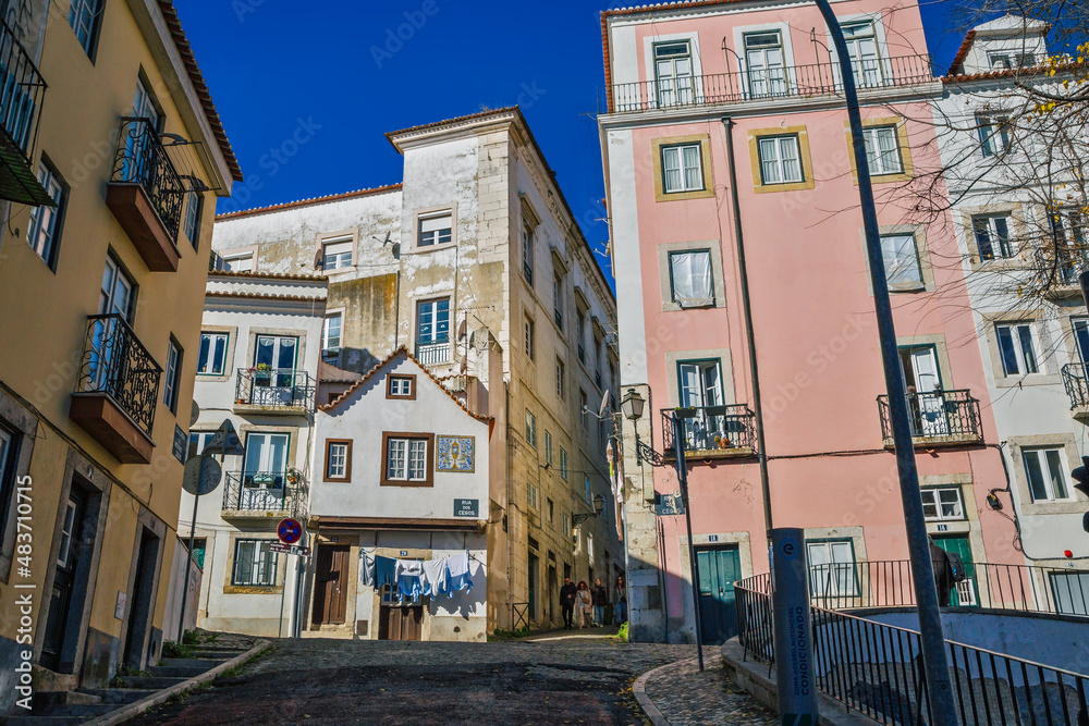 Alfama district traditional pedestrian narrow street. Lisbon Portugal