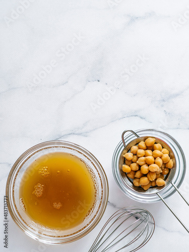 Chickpea aquafaba in a bowl photo