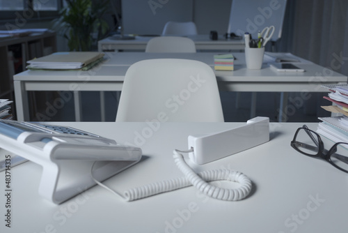 Work telephone call with handset off-hook photo
