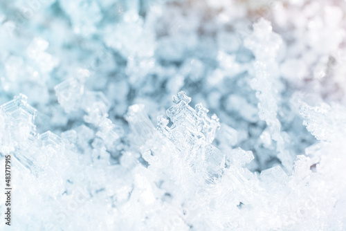 Crystal structure of ice against blurred background.