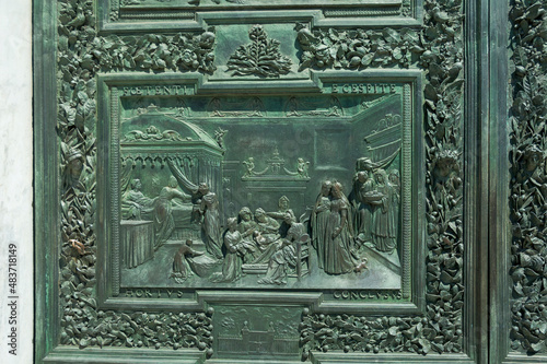 Pisa. Portale bronzeo del Duomo. Storie della Vergine Maria photo