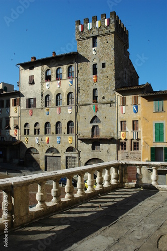 Arezzo. Piazza Grande con le Torri Merlate del Medioevo photo